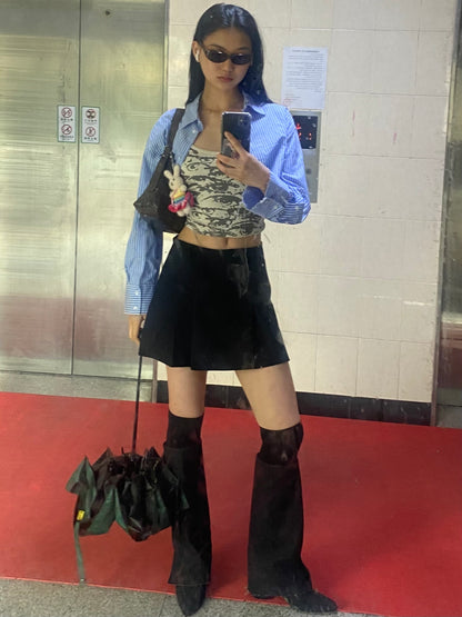 Japanese women's hairstyle comprised of a long braid tied up in a loop with a ribbon (ca. 1885)