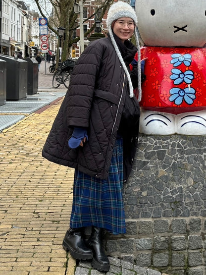 万紀子