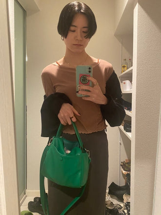 万紀子