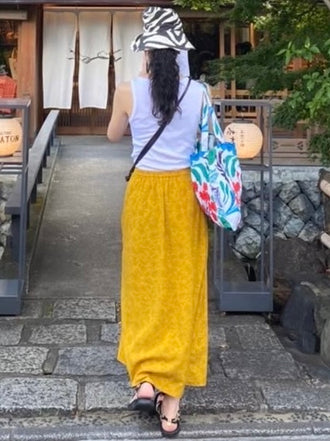 万紀子